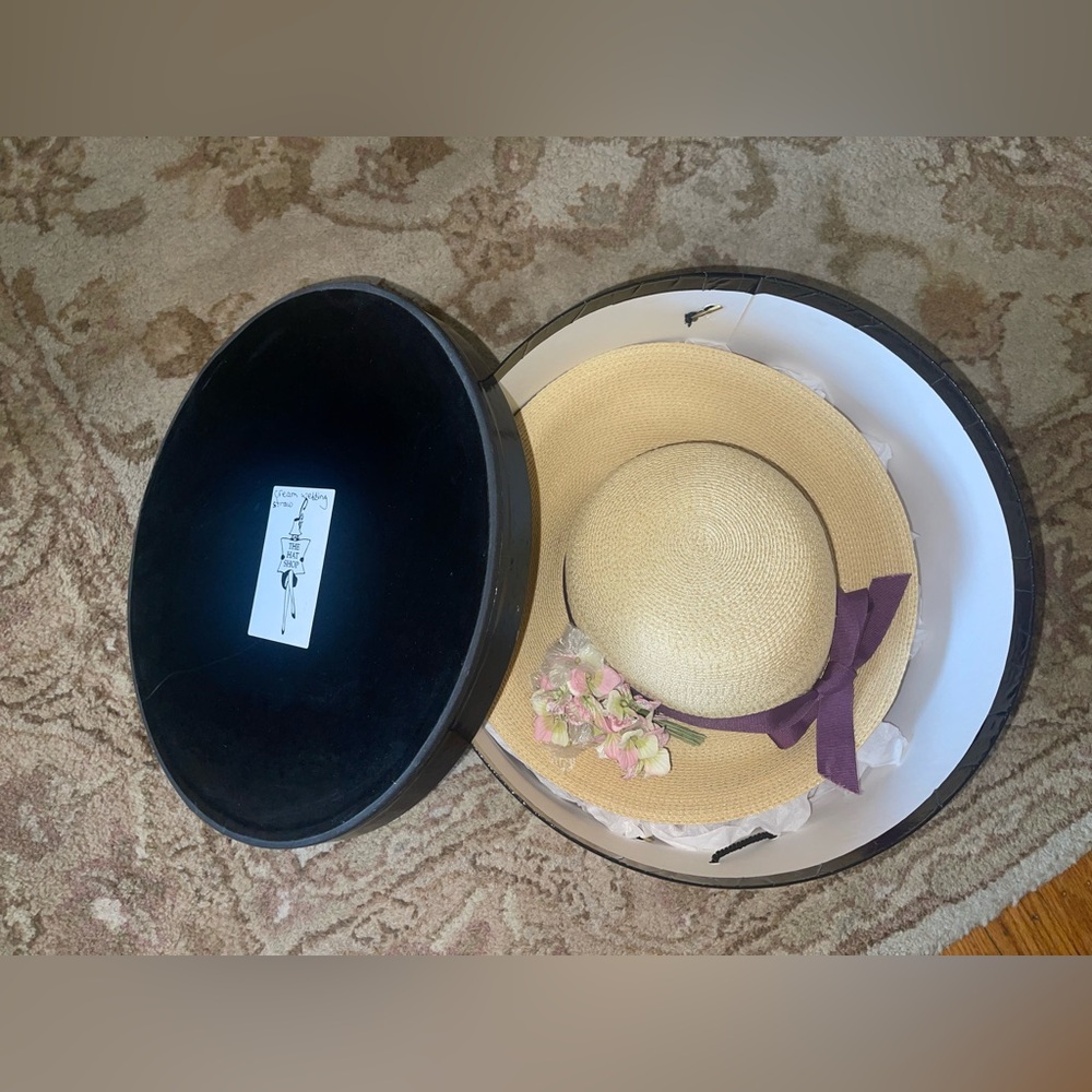 Elegant Straw Hat with Purple Ribbon